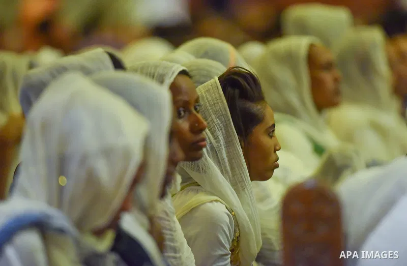 Egyptian Coptic Christians take part in an Easter Eve mass hosted by Pope Tawadros II at the St. Mark church in Cairo April 15, 2017. Photo by Amr Sayed