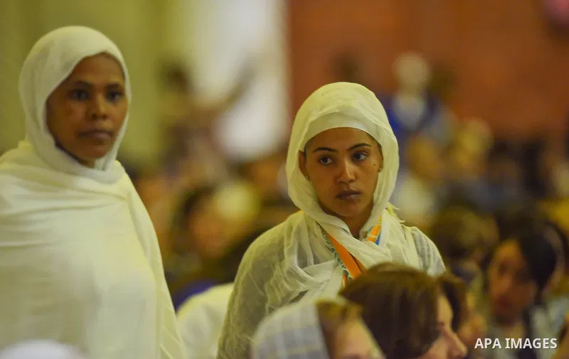 Egyptian Coptic Christians take part in an Easter Eve mass hosted by Pope Tawadros II at the St. Mark church in Cairo April 15, 2017. Photo by Amr Sayed