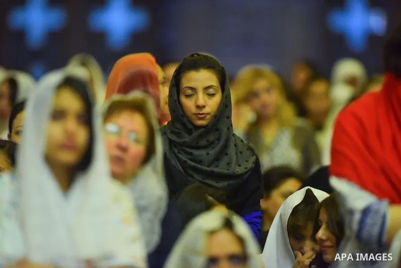Egyptian Coptic Christians take part in an Easter Eve mass hosted by Pope Tawadros II at the St. Mark church in Cairo April 15, 2017. Photo by Amr Sayed