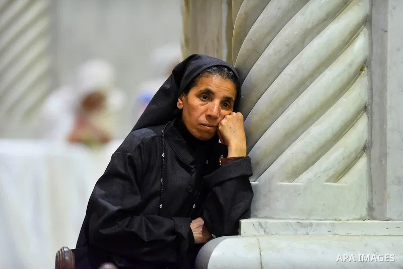 Egyptian Coptic Christians take part in an Easter Eve mass hosted by Pope Tawadros II at the St. Mark church in Cairo April 15, 2017. Photo by Amr Sayed
