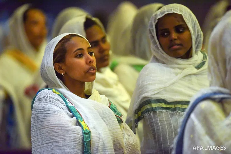 Egyptian Coptic Christians take part in an Easter Eve mass hosted by Pope Tawadros II at the St. Mark church in Cairo April 15, 2017. Photo by Amr Sayed