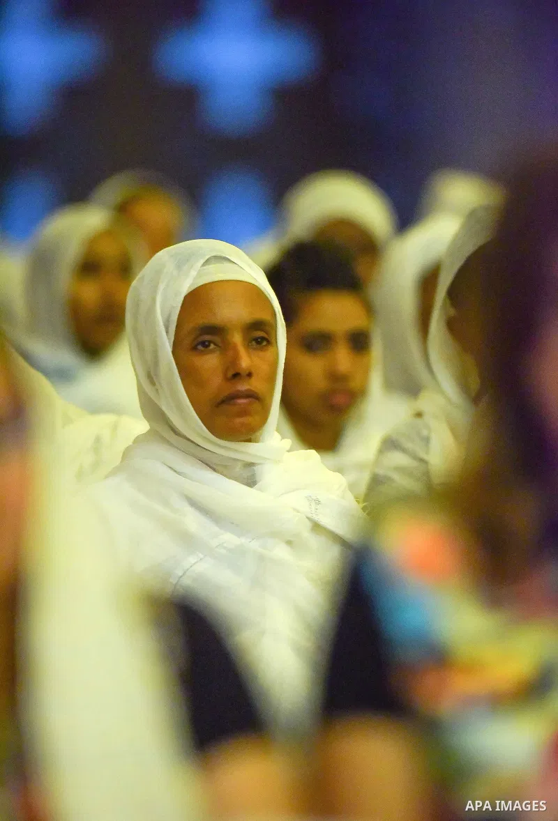 Egyptian Coptic Christians take part in an Easter Eve mass hosted by Pope Tawadros II at the St. Mark church in Cairo April 15, 2017. Photo by Amr Sayed