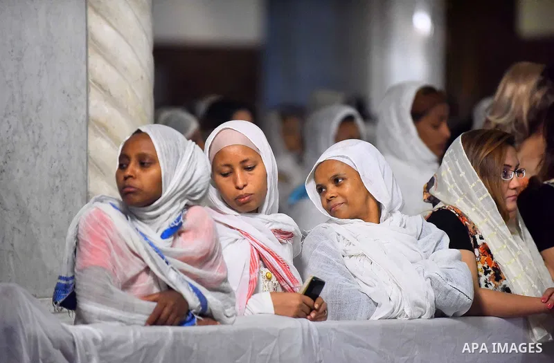 Egyptian Coptic Christians take part in an Easter Eve mass hosted by Pope Tawadros II at the St. Mark church in Cairo April 15, 2017. Photo by Amr Sayed