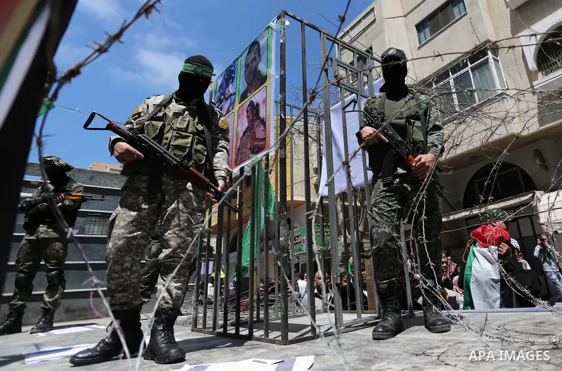 Protesters take part in a rally in support of Palestinian prisoners on hunger strike in Israeli jails marking Palestinian Prisoner Day, in Gaza City April 17, 2017. Hundreds of Palestinians in Israeli jails launched a hu...