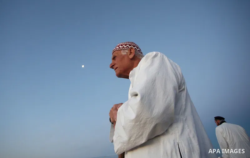 Members of the Samaritan sect take part in a traditional pilgrimage marking the holiday of Passover atop Mount Gerizim near the West Bank city of Nablus, on April 17, 2017. The Samaritans practice a religion that is base...