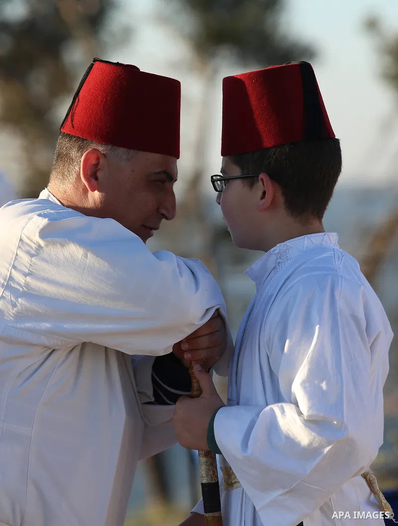 Members of the Samaritan sect take part in a traditional pilgrimage marking the holiday of Passover atop Mount Gerizim near the West Bank city of Nablus, on April 17, 2017. The Samaritans practice a religion that is base...
