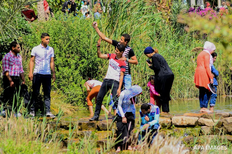 Egyptians enjoy during the celebration Sham El Nessim at a garden in Cairo, Egypt on April 17, 2017. Egyptians celebrate the Sham El Nessim, or the Festival of Spring Breeze, which marks the beginning of spring. Photo by...