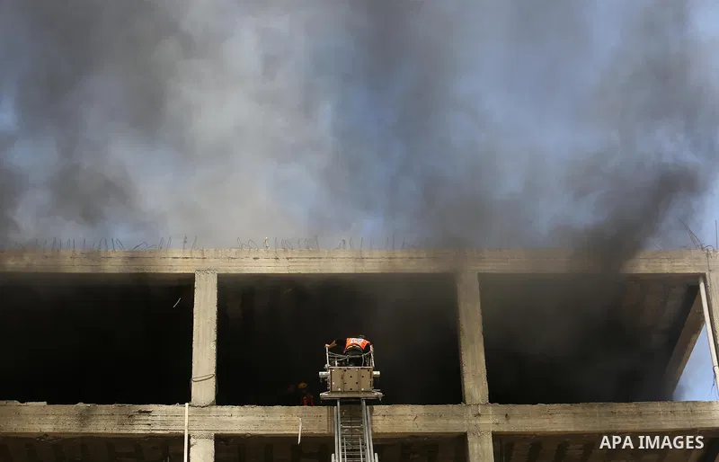 Palestinian Civil Defense members take part in a drill, in Gaza city, on April 18, 2017. Photo by Ashraf Amra