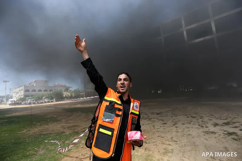 Palestinian Civil Defense members take part in a drill, in Gaza city, on April 18, 2017. Photo by Ashraf Amra