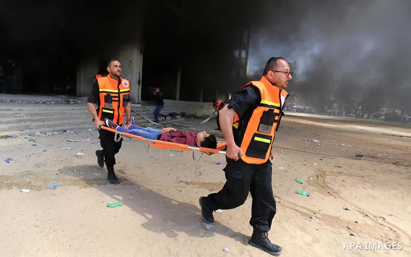 Palestinian Civil Defense members take part in a drill, in Gaza city, on April 18, 2017. Photo by Ashraf Amra
