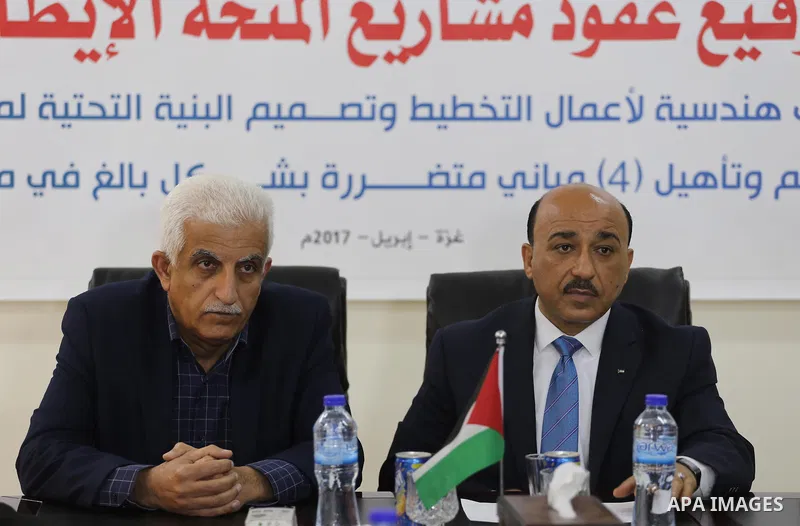 Palestinian housing minister Mufeed al-Hasayna, attends a signing ceremony of Italian grant projects in Gaza city on April 20, 2017. Photo by Mohammed Asad