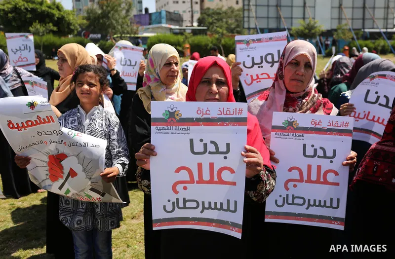 Palestinian Cancer patients take part in a protest to demand to travel for treatment, in Gaza city, on April 20, 2017. Photo by Ashraf Amra