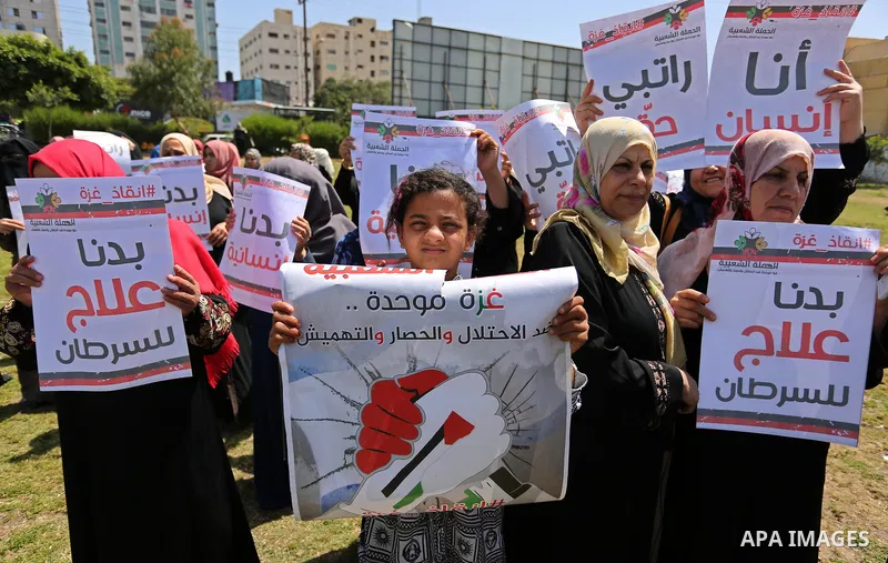Palestinian Cancer patients take part in a protest to demand to travel for treatment, in Gaza city, on April 20, 2017. Photo by Ashraf Amra
