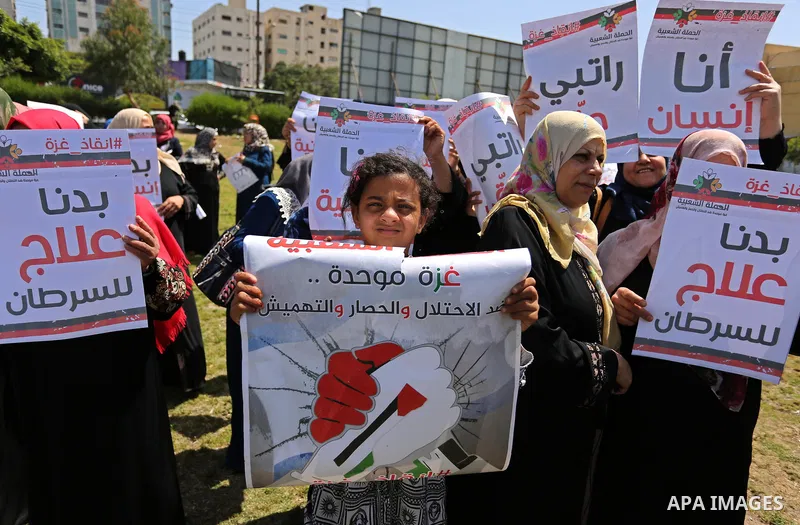 Palestinian Cancer patients take part in a protest to demand to travel for treatment, in Gaza city, on April 20, 2017. Photo by Ashraf Amra