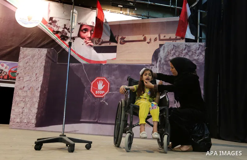 Palestinians perform during an operetta titled "enough blockade" on the International day in support of Gaza, in Gaza city on April 22, 2017. Photo by Ashraf Amra