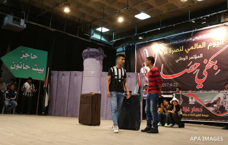Palestinians perform during an operetta titled "enough blockade" on the International day in support of Gaza, in Gaza city on April 22, 2017. Photo by Ashraf Amra