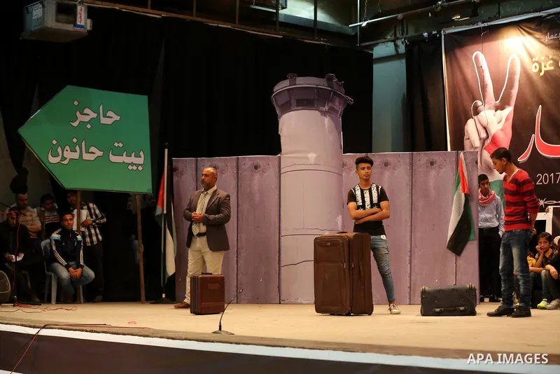 Palestinians perform during an operetta titled "enough blockade" on the International day in support of Gaza, in Gaza city on April 22, 2017. Photo by Ashraf Amra
