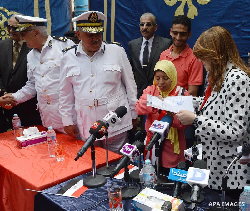 Mona El Sayed, an Egyptian woman known in media as "girl cart" receives a mini-bus which was funded by “Tahya Masr” (Long Live Egypt) fund in Cairo, Egypt, on April 22, 2017. Just days after his ascension to the presiden...