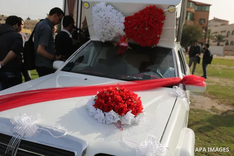 A Palestinian mechanic display his "Cinderella" vehicle in Gaza City on April 22, 2017. Made up of five different cars, it will be rented out for use at marriage ceremonies. Photo by Ashraf Amra