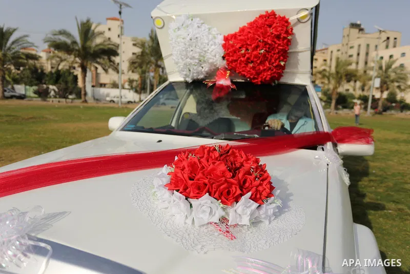 A Palestinian mechanic display his "Cinderella" vehicle in Gaza City on April 22, 2017. Made up of five different cars, it will be rented out for use at marriage ceremonies. Photo by Ashraf Amra