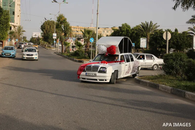 A Palestinian mechanic display his "Cinderella" vehicle in Gaza City on April 22, 2017. Made up of five different cars, it will be rented out for use at marriage ceremonies. Photo by Ashraf Amra