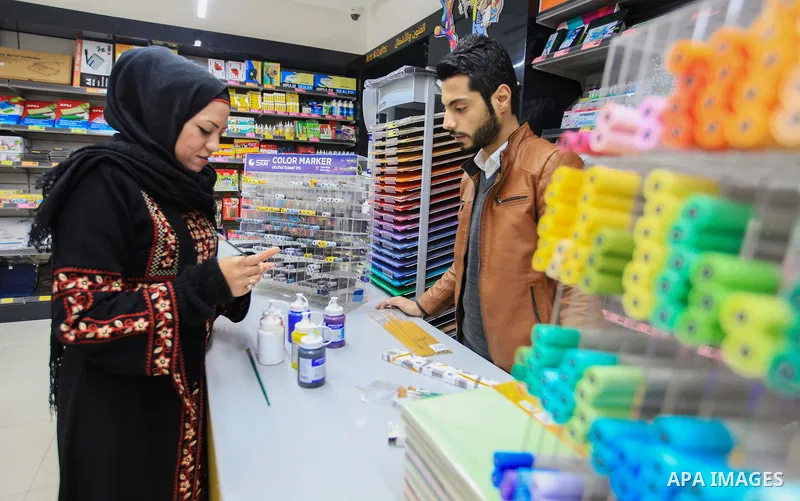 Hana Hamsh, a Palestinian artist ,27, buys special tools and colors for drawing in Gaza city on Feb. 15, 2017. Hamsh work at a teacher for draw and participated in more than 40 exhibitions and murals at the local and int...