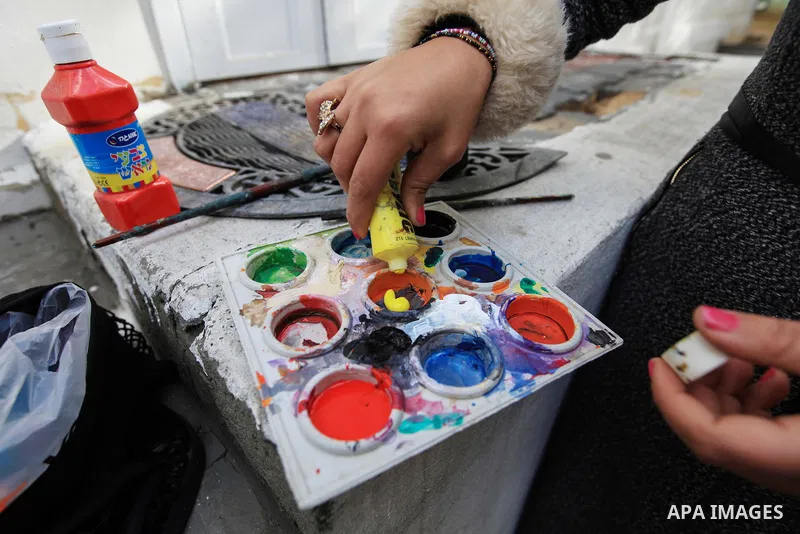 Hana Hamsh, a Palestinian artist ,27, paints artwork at her atelier in Gaza city on Feb. 15, 2017. Hamsh work at a teacher for draw and participated in more than 40 exhibitions and murals at the local and international....