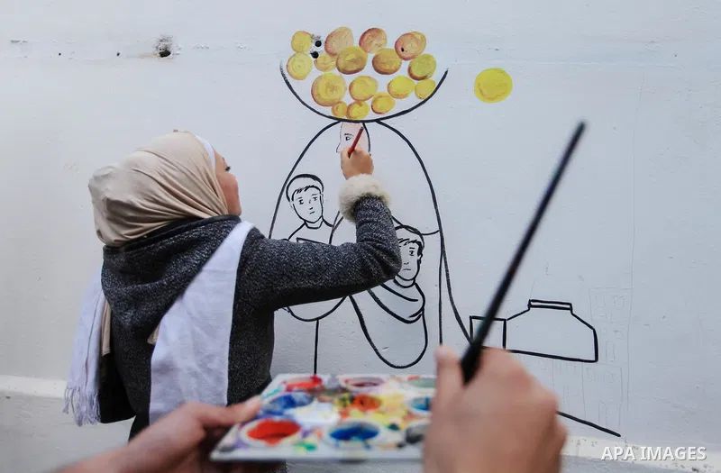 Hana Hamsh, a Palestinian artist ,27, paints artwork at her atelier in Gaza city on Feb. 15, 2017. Hamsh work at a teacher for draw and participated in more than 40 exhibitions and murals at the local and international....