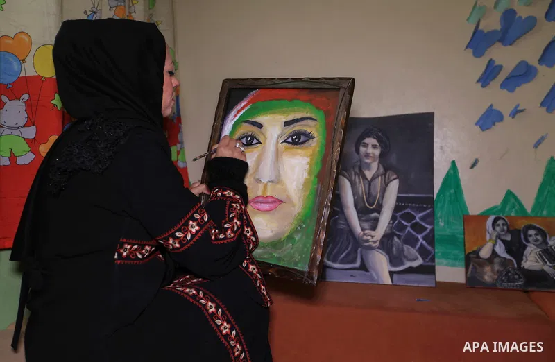 Hana Hamsh, a Palestinian artist ,27, paints artwork at her atelier in Gaza city on Feb. 15, 2017. Hamsh work at a teacher for draw and participated in more than 40 exhibitions and murals at the local and international....