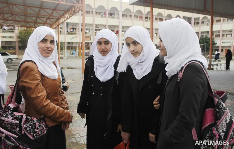 Asmaa Abu Hilal,18, a Palestinian blind student stands with her classmates at her school in Rafah in the southern Gaza strip on Feb. 14, 2017. Abu Hilal superior at her study although there are no private schools for the...