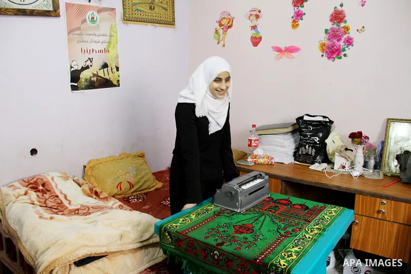 Asmaa Abu Hilal,18, a Palestinian blind studen stands at her family house in Rafah in the southern Gaza strip on Feb. 14, 2017. Abu Hilal superior at her study although there are no private schools for the blind in the c...
