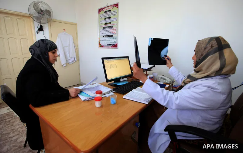 Aisha al-Baroud, 44, a Palestinian woman with breast cancer checked by a doctor in the northern Gaza stirp on Feb. 13, 2017. al-Baroud with breast cancer for more three years makes artificial breasts for mastectomy survi...