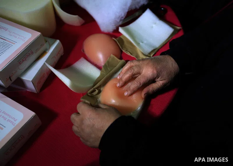 Aisha al-Baroud, 44, a Palestinian woman with breast cancer makes artificial breasts for mastectomy survivors for free, in the northern Gaza stirp on Feb. 13, 2017. Al-Baroud with breast cancer for more three years and s...