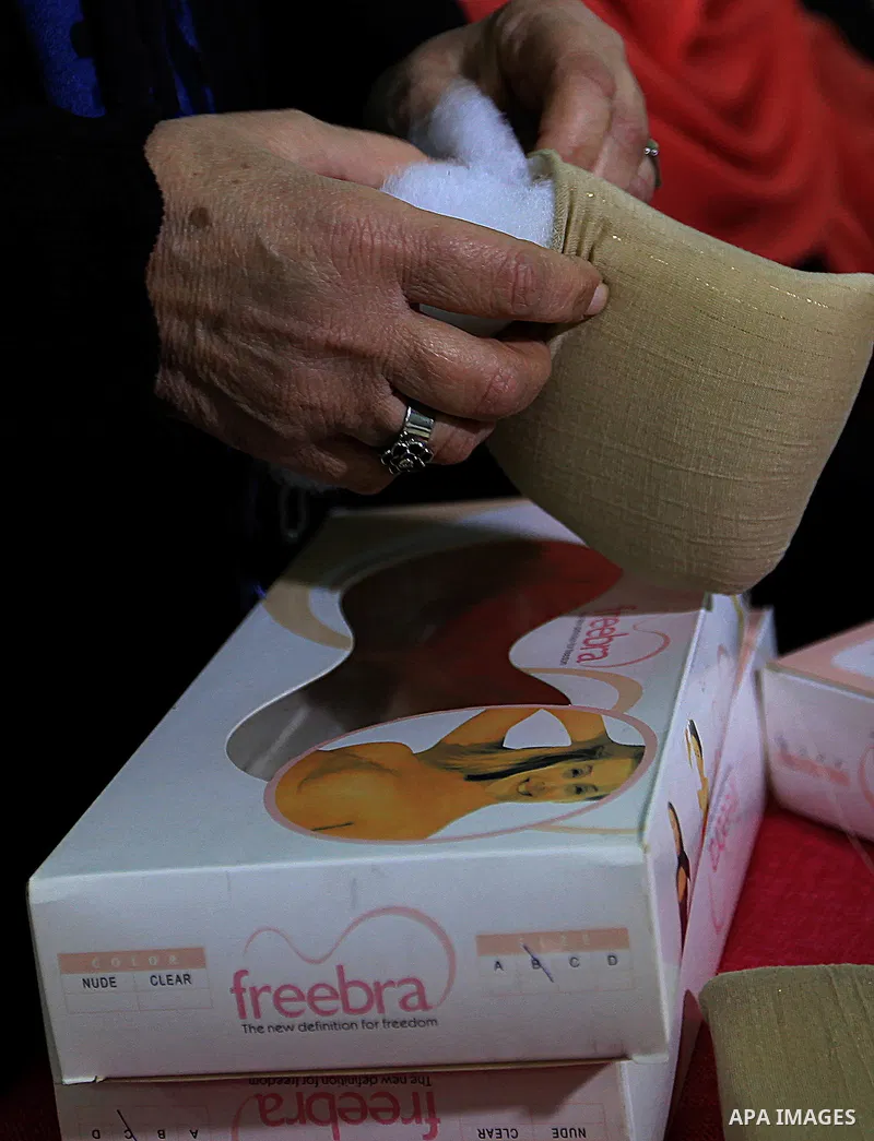Aisha al-Baroud, 44, a Palestinian woman with breast cancer makes artificial breasts for mastectomy survivors for free, in the northern Gaza stirp on Feb. 13, 2017. Al-Baroud with breast cancer for more three years and s...