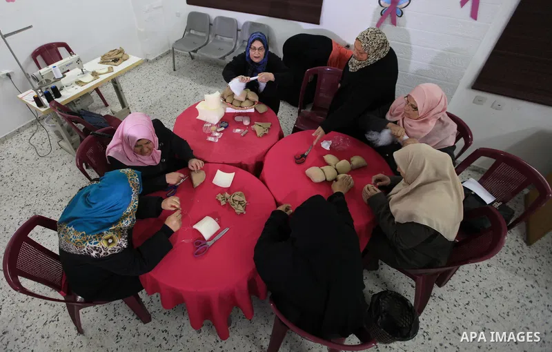 Aisha al-Baroud, 44, a Palestinian woman with breast cancer and her colleagues make artificial breasts for mastectomy survivors for free, in the northern Gaza stirp on Feb. 13, 2017. Al-Baroud with breast cancer for more...