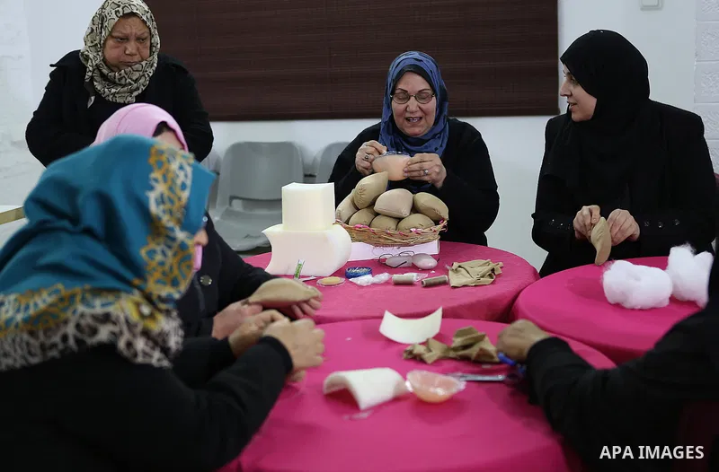 Aisha al-Baroud, 44, a Palestinian woman with breast cancer and her colleagues make artificial breasts for mastectomy survivors for free, in the northern Gaza stirp on Feb. 13, 2017. Al-Baroud with breast cancer for more...