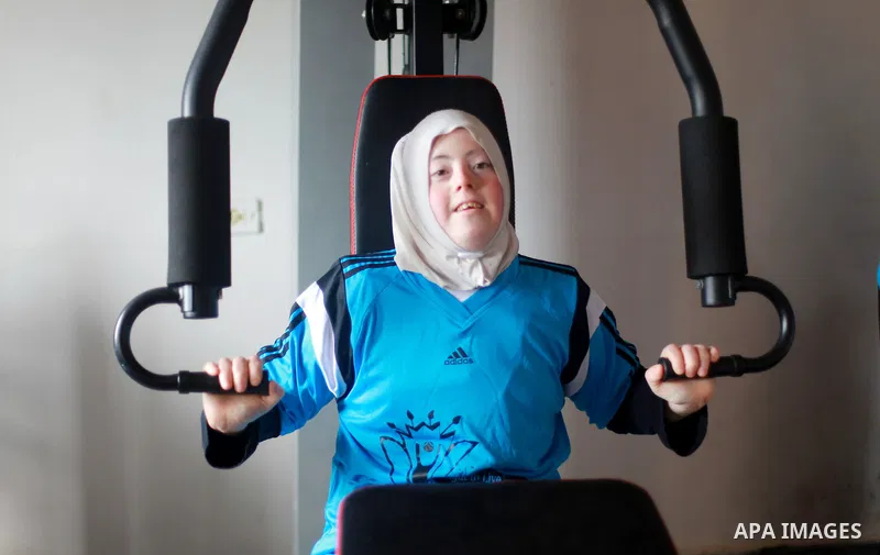 Iman al-Tanani, a 28-year-old a Palestinian woman with Down syndrome plays sports at Gym in Gaza city on Feb. 16, 2017. al-Tanani got work from United Nations Relief and Works Agency (UNRWA) on handmade, moreover she pla...