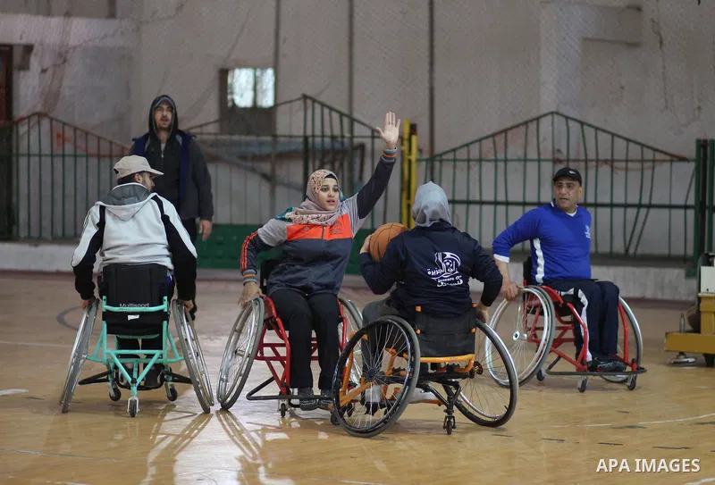 Disabled Palestinians take part in a training course to play basketball at al-Jazeera club in Gaza city on April 12, 2017. Disabled Palestinians from al-Jazeera club got many medals on thier participate in international...