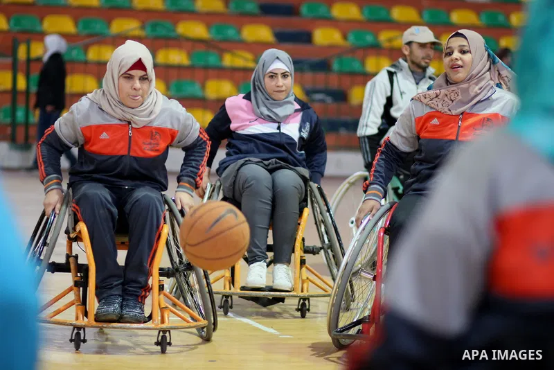 Disabled Palestinians take part in a training course to play basketball at al-Jazeera club in Gaza city on April 12, 2017. Disabled Palestinians from al-Jazeera club got many medals on thier participate in international...
