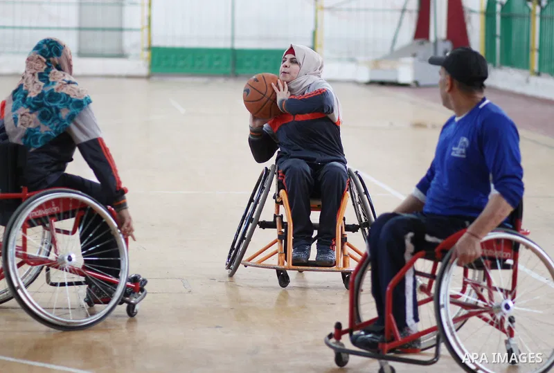 Disabled Palestinians take part in a training course to play basketball at al-Jazeera club in Gaza city on April 12, 2017. Disabled Palestinians from al-Jazeera club got many medals on thier participate in international...