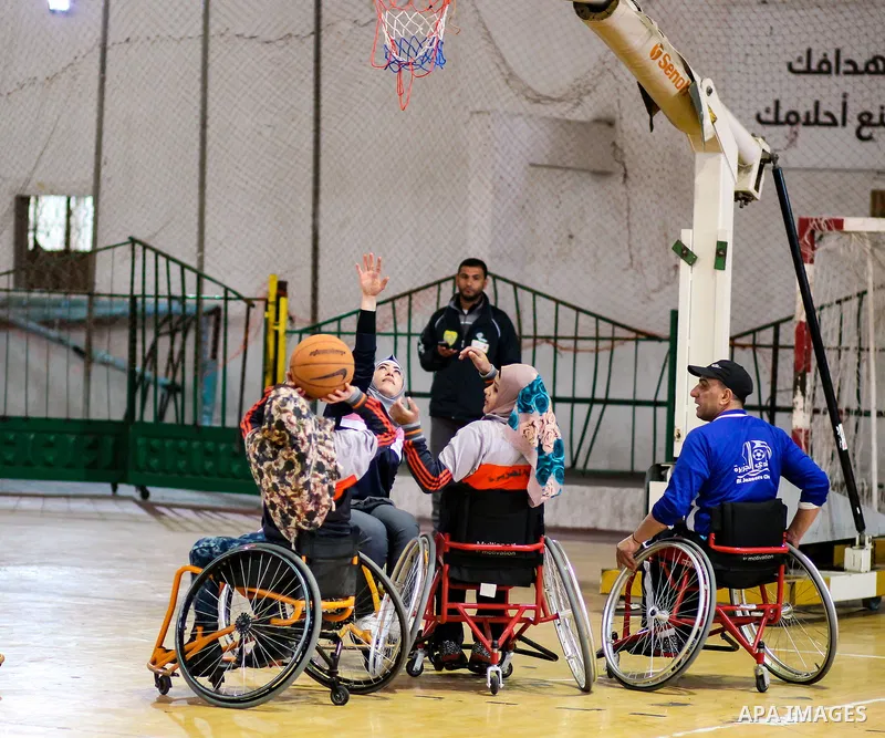 Disabled Palestinians take part in a training course to play basketball at al-Jazeera club in Gaza city on April 12, 2017. Disabled Palestinians from al-Jazeera club got many medals on thier participate in international...