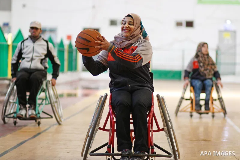 Disabled Palestinians take part in a training course to play basketball at al-Jazeera club in Gaza city on April 12, 2017. Disabled Palestinians from al-Jazeera club got many medals on thier participate in international...