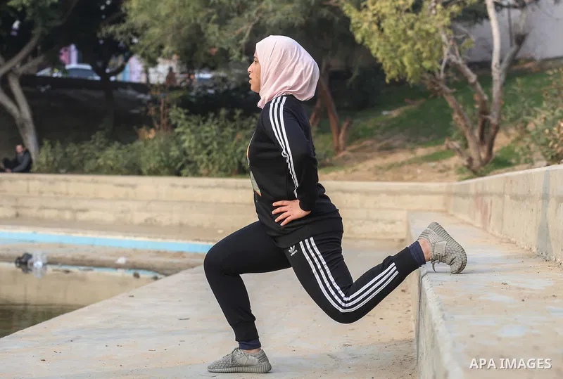 Dania El Masry, 20-years old a Palestinian woman from Khan younis student of Physical Therapy, plays CrossFit sport at a garden in the southern Gaza strip, on Feb. 07, 2017. CrossFit workouts incorporate elements from hi...