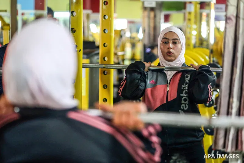 Dania El Masry, 20-years old a Palestinian woman from Khan younis student of Physical Therapy, plays CrossFit sport at Gym in the southern Gaza strip, on Feb. 07, 2017. CrossFit workouts incorporate elements from high-in...