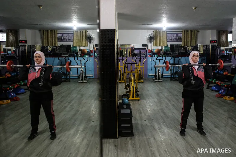 Dania El Masry, 20-years old a Palestinian woman from Khan younis student of Physical Therapy, plays CrossFit sport at Gym in the southern Gaza strip, on Feb. 07, 2017. CrossFit workouts incorporate elements from high-in...