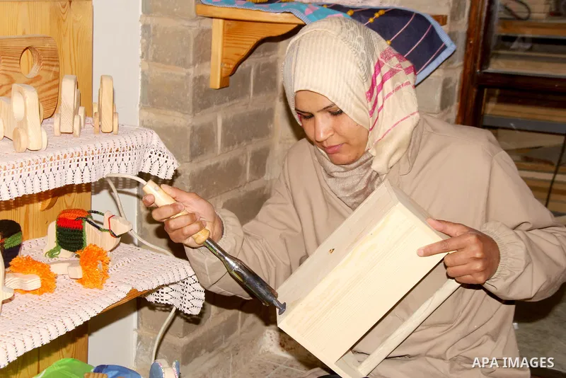 A Palestinian woman works at at a carpentry in Beit Lahia in the northern Gaza strip on Feb. 14, 2017. More than 8 woman works at carpentry to help their husbands as the Israeli blockade of the Gaza Strip continues. They...
