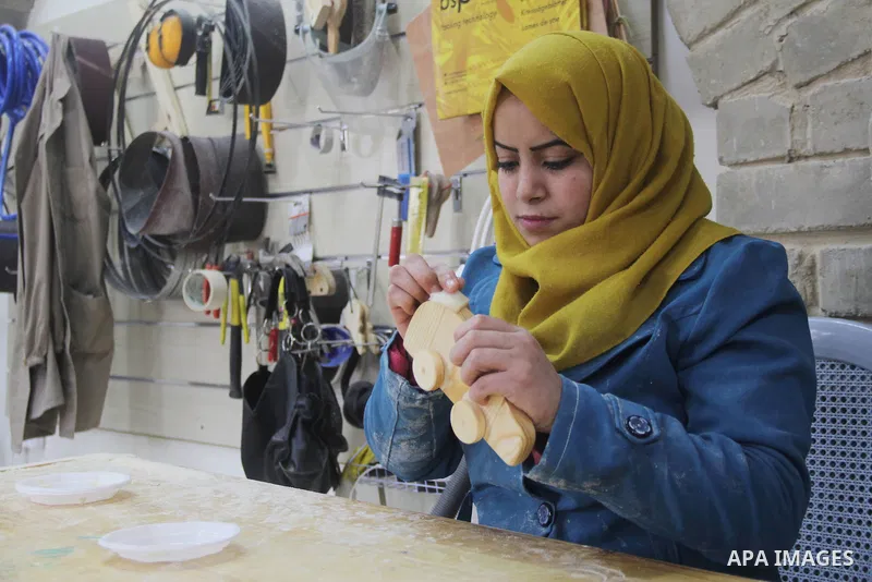 Ghadir Tayeh, 26, a Palestinian woman works at a carpentry in Beit Lahia in the northern Gaza strip on Feb. 14, 2017. Tayeh works on carpentry alongside with another 8 woman to help their husbands as the Israeli blockade...