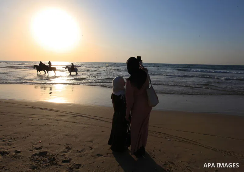 Sawsan Al Khalili, 40 years-old, a Palestinian woman of special needs takes a selfie with her friend at the beach of Gaza city on Feb. 11, 2017. Al Khalili secretary general of the general union of the Palestinian disabl...