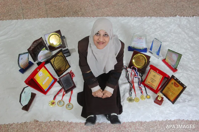 Sawsan Al Khalili, 40 years-old, a Palestinian woman of special needs poses for a photo in Gaza city on Feb. 11, 2017. Al Khalili secretary general of the general union of the Palestinian disabled and a head of the Pales...