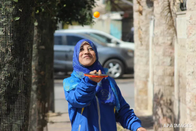 Sawsan Al Khalili, 40 years-old, a Palestinian woman of special needs plays table tennis in Gaza city on Feb. 11, 2017. Al Khalili secretary general of the general union of the Palestinian disabled and a head of the Pale...